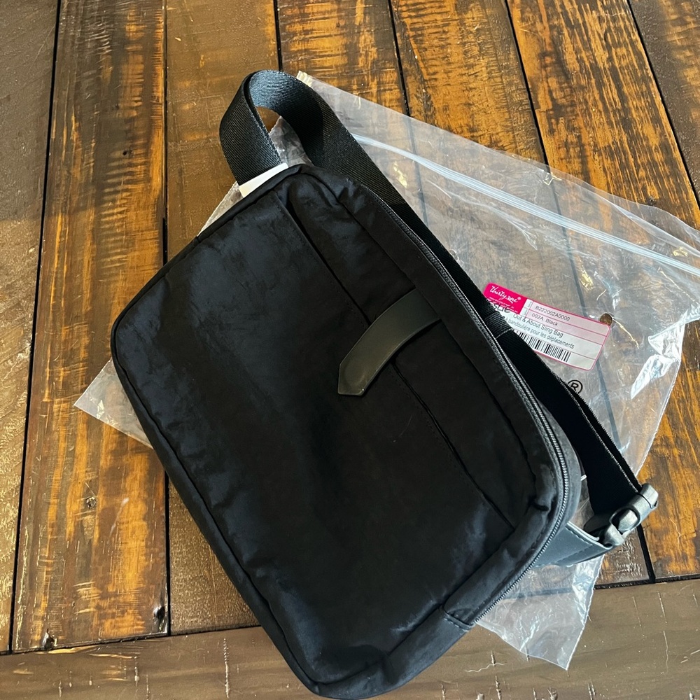 Brand new black 31 sling bag (lululemon style) Sfh cross